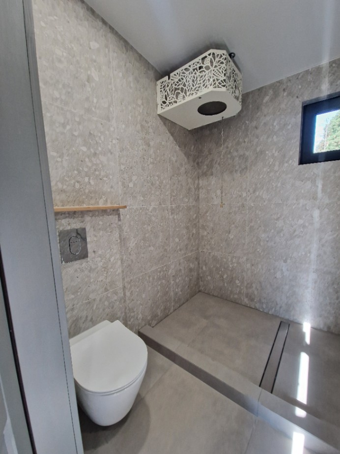 Insulated sauna house