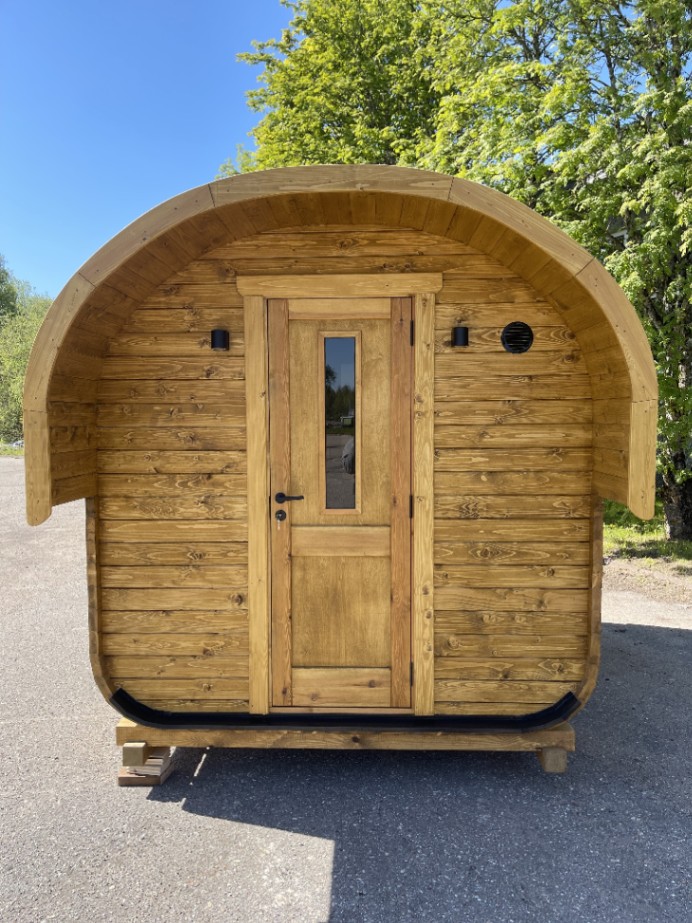 attēls, kurā attēlota koka moduļu māja