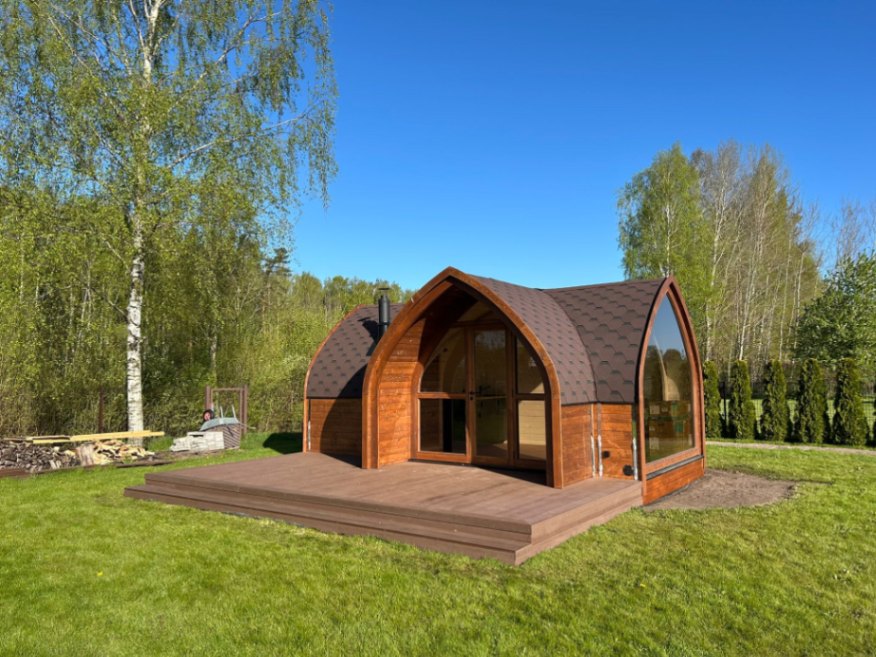 attēls, kurā attēlota koka moduļu māja