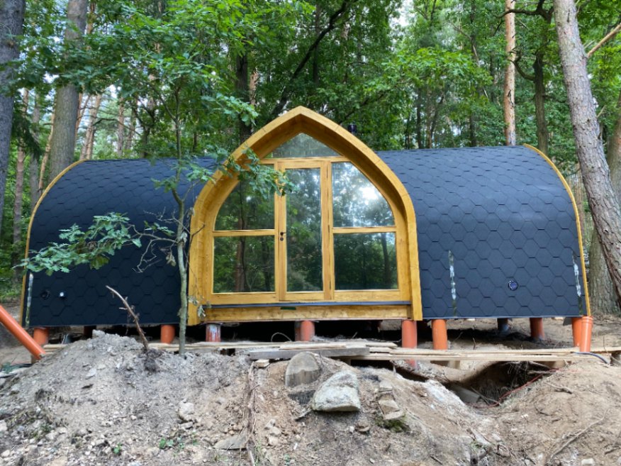 attēls, kurā attēlota koka moduļu māja